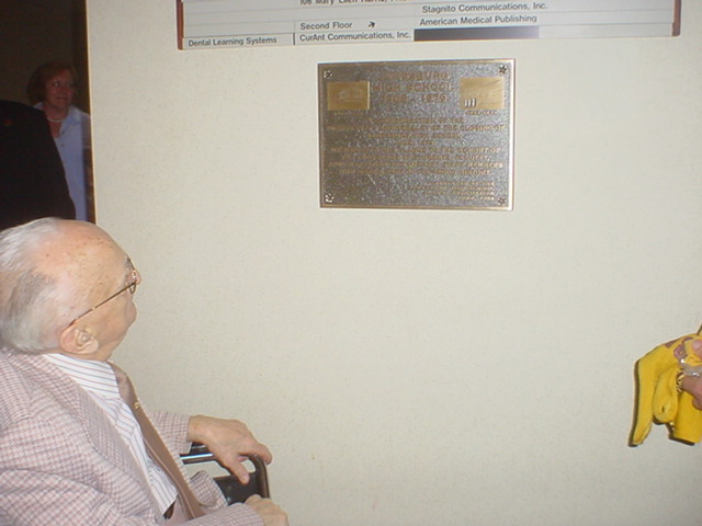 Richard J. 'Coach' Matteo, former JHS Athletic Director and Coach, Admires the Plaque